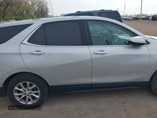 2018 Chevrolet Equinox LT z VIN 2GNAXJEV2J6202865, wystawiony jako IAAI lot #42029667 z przebiegiem 87 792 mil mil oraz . Historia ofert i sprzedaży dostępna na DreamBid. Obrazek 14.
