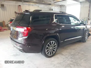 2021 GMC Acadia Denali with VIN 1GKKNXLS2MZ140119, listed as a IAAI auction lot 42553557 with 50,197 mi miles and . Bid and sale history available at DreamBid. Image 4.