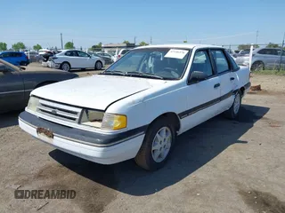 1988 Ford Tempo z VIN 1FAPP36X6JK132773, wystawiony jako IAAI lot #42146576 z przebiegiem 80 452 mil mil oraz . Historia ofert i sprzedaży dostępna na DreamBid. Obrazek 2.