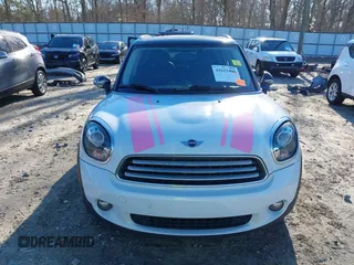 2012 MINI Countryman with VIN WMWZB3C50CWM30524, listed as a IAAI auction lot 41623400 with 194,858 mi miles and . Bid and sale history available at DreamBid. Image 12.