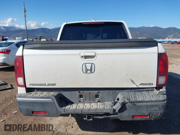 2020 Honda Ridgeline RTL with VIN 5FPYK3F50LB028430, listed as a IAAI auction lot 42033090 with Not provided miles and . Bid and sale history available at DreamBid. Image 16.