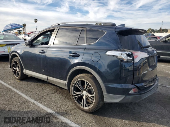 2017 Toyota RAV4 LE with VIN 2T3BFREV4HW660064, listed as a Copart auction lot 43660485 with 100,225 mi miles and Salvage Title. Bid and sale history available at DreamBid. Image 2.