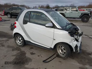 2013 Smart fortwo Pure with VIN WMEEJ3BA2DK702004, listed as a IAAI auction lot 41829808 with 53,545 mi miles and . Bid and sale history available at DreamBid. Image 1.