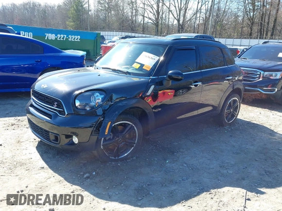 2015 MINI Countryman S with VIN WMWZC3C5XFWT04916, listed as a IAAI auction lot 41636369 with 101,448 mi miles and . Bid and sale history available at DreamBid. Image 2.