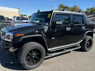 2005 Hummer H2 SUT with VIN 5GRGN22U35H113041, listed as a Copart auction lot 76730334 with 269,232 mi miles and Clean Title. Bid and sale history available at carsss.com. Image 2.