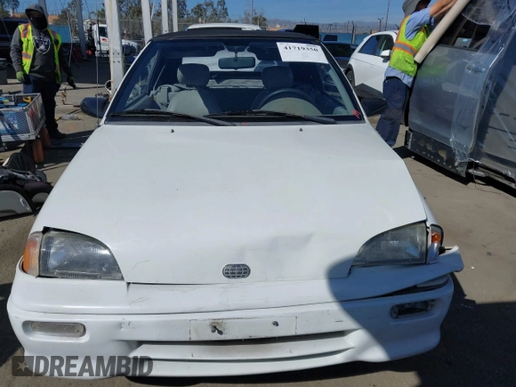 1992 Geo Metro z VIN JG1MR3364NK213871, wystawiony jako IAAI lot #41719350 z przebiegiem 22 589 mil mil oraz . Historia ofert i sprzedaży dostępna na DreamBid. Obrazek 12.