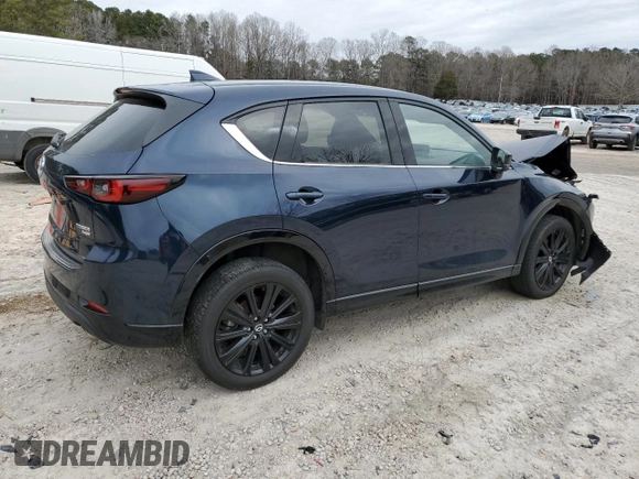 2022 Mazda CX-5 2.5 Turbo with VIN JM3KFBAY3N0603921, listed as a Copart auction lot 43679495 with 27,073 mi miles and Salvage Title. Bid and sale history available at carsss.com. Image 3.