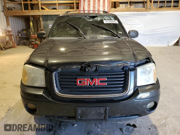 2005 GMC Envoy SLT with VIN 1GKDT13S752168679, listed as a Copart auction lot 41789945 with 0 mi miles and Salvage Title. Bid and sale history available at carsss.com. Image 5.