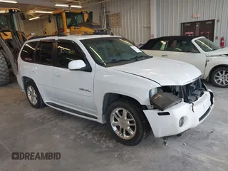 2006 GMC Envoy Denali z VIN 1GKET63M362104482, wystawiony jako IAAI lot #38527651 z przebiegiem 216 644 mil mil oraz . Historia ofert i sprzedaży dostępna na DreamBid. Obrazek 1.