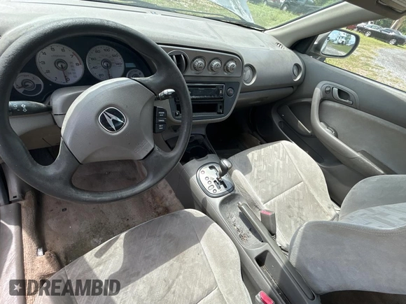 2003 Acura RSX z VIN JH4DC54873S002163, wystawiony jako Copart lot #51872605 z przebiegiem Nie podano mil oraz Szkoda całkowita • Salvage title. Historia ofert i sprzedaży dostępna na DreamBid. Obrazek 9.