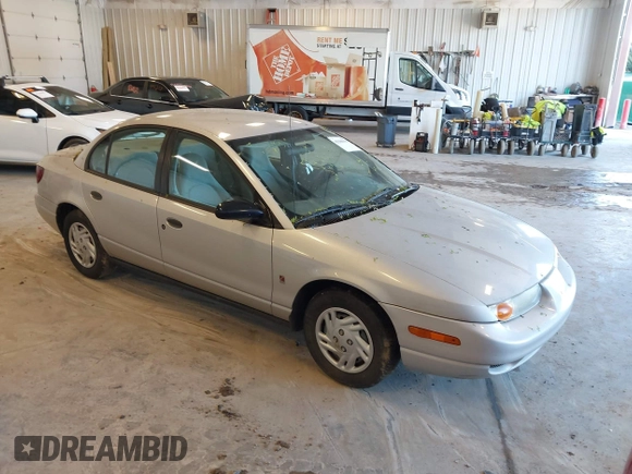 2001 Saturn SL z VIN 1G8ZF52841Z208220, wystawiony jako IAAI lot #42288195 z przebiegiem Nie podano mil oraz . Historia ofert i sprzedaży dostępna na DreamBid. Obrazek 1.