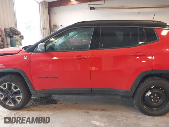 2018 Jeep Compass Trailhawk with VIN 3C4NJDDB4JT169366, listed as a IAAI auction lot 42389456 with 128,980 mi miles and . Bid and sale history available at DreamBid. Image 14.