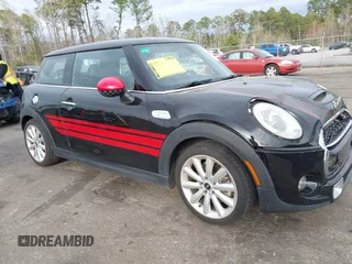 2014 MINI Hardtop S with VIN WMWXM7C50ET986183, listed as a IAAI auction lot 41719571 with 88,528 mi miles and . Bid and sale history available at DreamBid. Image 1.