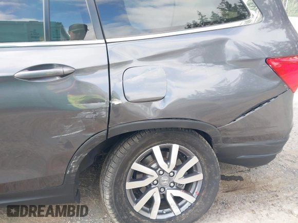 2019 Honda Pilot EX-L with VIN 5FNYF6H52KB035504, listed as a IAAI auction lot 42642735 with 54,736 mi miles and . Bid and sale history available at DreamBid. Image 6.