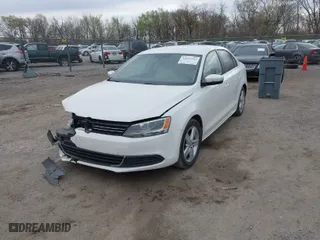 2014 Volkswagen Jetta Sedan TDI with VIN 3VWLL7AJXEM372547, listed as a IAAI auction lot 42021962 with 113,200 mi miles. Bid and sale history available at carsss.com. Image 2.
