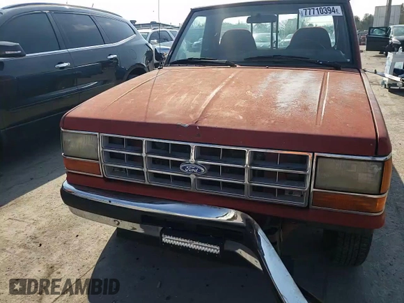 1989 Ford Ranger Splash with VIN 1FTCR10A2KUB58322, listed as a Copart auction lot 77710394 with 890,534 mi miles and Salvage Title. Bid and sale history available at DreamBid. Image 10.
