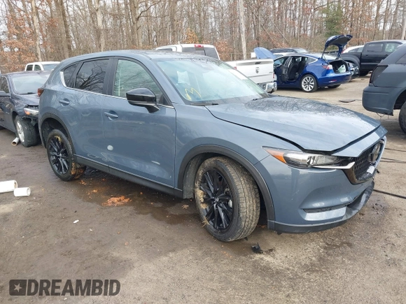 2021 Mazda CX-5 Touring with VIN JM3KFBCM5M0332644, listed as a IAAI auction lot 41083205 with 36,105 mi miles. Bid and sale history available at carsss.com. Image 1.