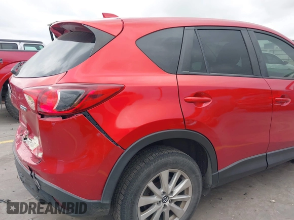 2015 Mazda CX-5 Touring with VIN JM3KE4CYXF0439953, listed as a IAAI auction lot 42124197 with 242,614 mi miles and . Bid and sale history available at DreamBid. Image 18.