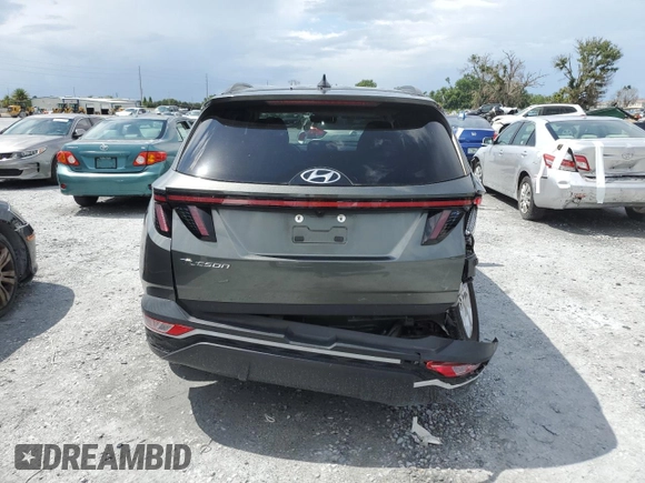 2022 Hyundai Tucson SEL z VIN 5NMJB3AE9NH057198, wystawiony jako Copart lot #60405555 z przebiegiem 51 012 mil mil oraz Nie do naprawy • Non repairable. Historia ofert i sprzedaży dostępna na DreamBid. Obrazek 6.