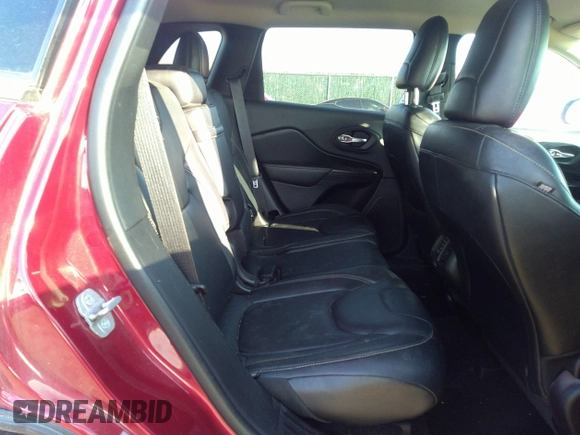 2014 Jeep Cherokee Limited with VIN 1C4PJMDB7EW165272, listed as a IAAI auction lot 35106260 with 102,934 mi miles and . Bid and sale history available at DreamBid. Image 8.