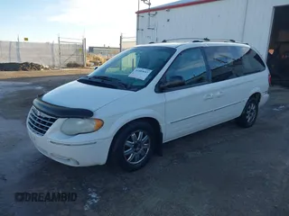 2005 Chrysler Town & Country Limited with VIN 2C8GP64L25R161995, listed as a IAAI auction lot 41403697 with 244,202 mi miles. Bid and sale history available at carsss.com. Image 2.
