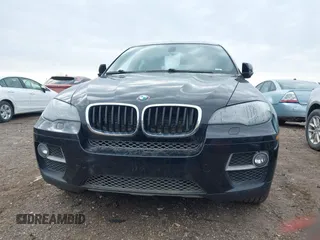 2014 BMW X6 xDrive35i z VIN 5UXFG2C56E0C45631, wystawiony jako IAAI lot #41967186 z przebiegiem 86 773 mil mil oraz . Historia ofert i sprzedaży dostępna na DreamBid. Obrazek 13.