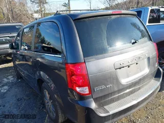 2017 Dodge Grand Caravan SXT with VIN 2C4RDGCG8HR818123, listed as a IAAI auction lot 41304401 with 164,236 mi miles. Bid and sale history available at carsss.com. Image 3.