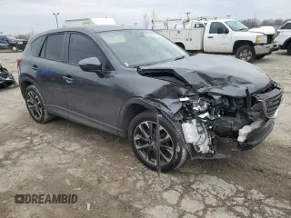 2016 Mazda CX-5 Grand Touring with VIN JM3KE4DY5G0691013, listed as a Copart auction lot 44700235 with 106,097 mi miles and Clean Title. Bid and sale history available at carsss.com. Image 4.