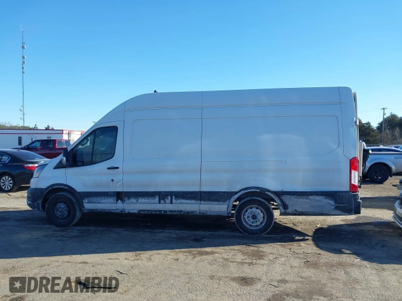 2021 Ford Transit Cargo with VIN 1FTBW3X82MKA14027, listed as a IAAI auction lot 41423524 with 121,221 mi miles. Bid and sale history available at carsss.com. Image 14.