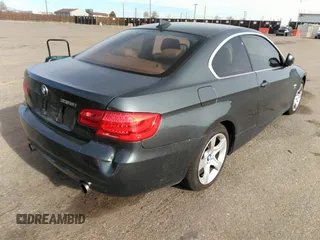 2011 BMW 3 Series 335i xDrive with VIN WBAKF9C56BE619143, listed as a IAAI auction lot 41765227 with 159,620 mi miles. Bid and sale history available at carsss.com. Image 4.