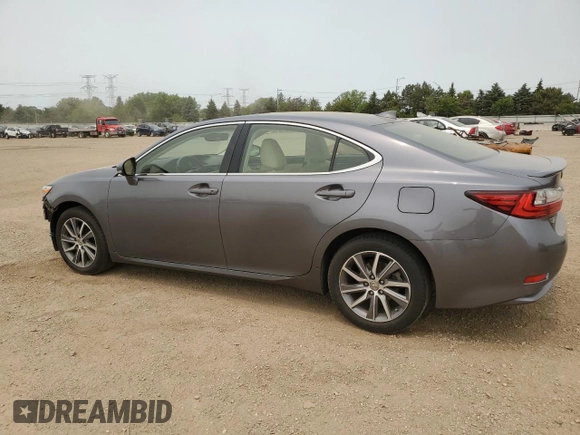 2016 Lexus ES 300h with VIN JTHBW1GG5G2103282, listed as a Copart auction lot 58801825 with 81,917 mi miles and Salvage title. Bid and sale history available at DreamBid. Image 2.