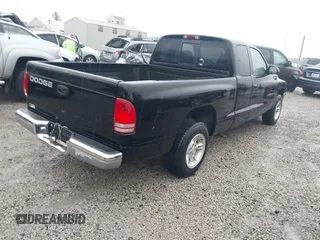2000 Dodge Dakota with VIN 1B7GL22X6YS703226, listed as a IAAI auction lot 40849454 with 105,990 mi miles. Bid and sale history available at carsss.com. Image 4.
