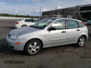2007 Ford Focus S with VIN 1FAHP37N67W268162, listed as a Copart auction lot 71736384 with 69,391 mi miles and Salvage Title. Bid and sale history available at DreamBid. Image 1.