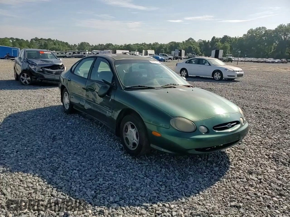 1999 Ford Taurus SE with VIN 1FAFP53U2XG184723, listed as a Copart auction lot 60787115 with 128,277 mi miles and Salvage title. Bid and sale history available at DreamBid. Image 13.