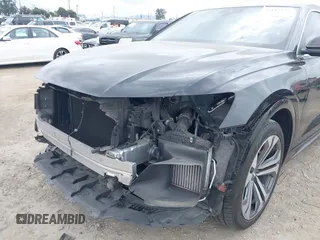 2019 Audi Q8 Premium Plus z VIN WA1BVAF13KD044077, wystawiony jako IAAI lot #39445353 z przebiegiem 55 333 mil mil oraz . Historia ofert i sprzedaży dostępna na DreamBid. Obrazek 6.