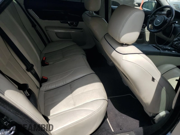 2015 Jaguar XJ with VIN SAJWA2GZXF8V88962, listed as a Copart auction lot 53919035 with 129,987 mi miles and Salvage Title. Bid and sale history available at carsss.com. Image 10.