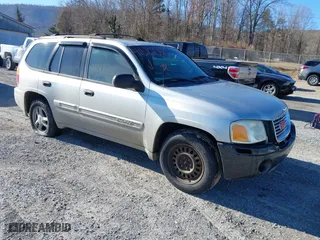 2004 GMC Envoy SLE with VIN 1GKDT13S842134524, listed as a IAAI auction lot 41610041 with 217,166 mi miles. Bid and sale history available at carsss.com. Image 1.