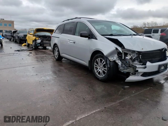 2012 Honda Odyssey EX-L with VIN 5FNRL5H68CB141022, listed as a Copart auction lot 54605485 with 185,388 mi miles and Salvage Title. Bid and sale history available at carsss.com. Image 15.