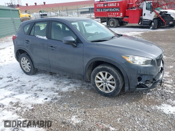 2013 Mazda CX-5 Sport z VIN JM3KE2BE9D0156274, wystawiony jako IAAI lot #41624466 z przebiegiem 159 017 mil mil oraz . Historia ofert i sprzedaży dostępna na DreamBid. Obrazek 1.