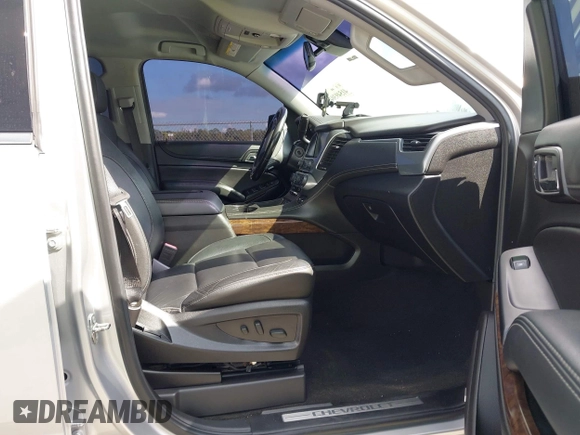 2018 Chevrolet Tahoe LT with VIN 1GNSCBKCXJR367852, listed as a IAAI auction lot 41549304 with 151,684 mi miles and . Bid and sale history available at DreamBid. Image 5.