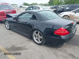 2003 Mercedes-Benz SL 500 z VIN WDBSK75FX3F029398, wystawiony jako IAAI lot #42289295 z przebiegiem Nie podano mil oraz . Historia ofert i sprzedaży dostępna na DreamBid. Obrazek 3.
