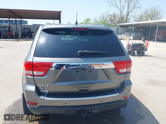 2013 Jeep Grand Cherokee Overland with VIN 1C4RJFCG2DC611877, listed as a IAAI auction lot 41910800 with 151,457 mi miles. Bid and sale history available at carsss.com. Image 16.