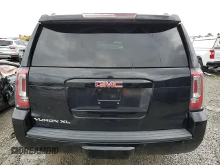 2015 GMC Yukon XL SLT z VIN 1GKS2HKC1FR695168, wystawiony jako Copart lot #54665975 z przebiegiem 132 545 mil mil oraz Szkoda całkowita • Salvage title. Historia ofert i sprzedaży dostępna na DreamBid. Obrazek 6.