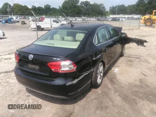 2012 Volkswagen Passat SE z VIN 1VWBN7A30CC073400, wystawiony jako IAAI lot #42284473 z przebiegiem 144 782 mil mil oraz . Historia ofert i sprzedaży dostępna na DreamBid. Obrazek 4.