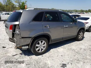 2013 Kia Sorento LX z VIN 5XYKT3A6XDG408459, wystawiony jako Copart lot #52556785 z przebiegiem 195 680 mil mil oraz Szkoda całkowita • Salvage title. Historia ofert i sprzedaży dostępna na DreamBid. Obrazek 3.