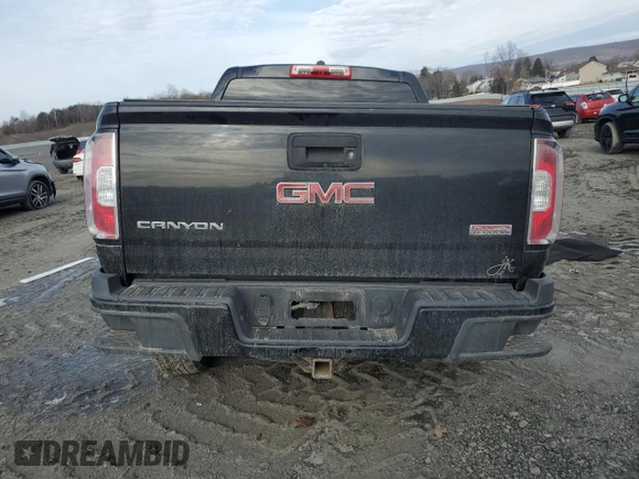 2015 GMC Canyon 4WD SLE with VIN 1GTG6BE34F1165547, listed as a Copart auction lot 43930715 with 124,970 mi miles and Salvage Title. Bid and sale history available at carsss.com. Image 6.