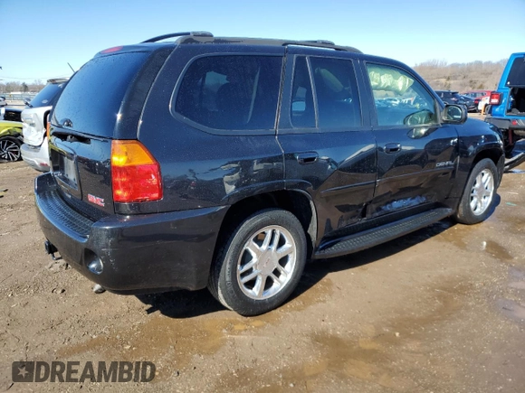 2008 GMC Envoy Denali with VIN 1GKET63M282161131, listed as a Copart auction lot 48054005 with 89,704 mi miles and Salvage Title. Bid and sale history available at carsss.com. Image 3.