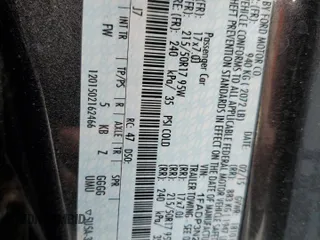 2015 Ford Focus Titanium z VIN 1FADP3N28FL239706, wystawiony jako Copart lot #62478895 z przebiegiem 143 536 mil mil oraz Szkoda całkowita • Salvage title. Historia ofert i sprzedaży dostępna na DreamBid. Obrazek 13.