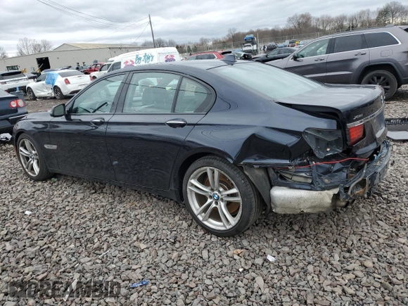 2015 BMW 7 Series 750i xDrive with VIN WBAYB6C56FD965841, listed as a Copart auction lot 48748145 with 102,305 mi miles and Salvage Title. Bid and sale history available at carsss.com. Image 2.