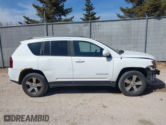 2016 Jeep Compass High Altitude with VIN 1C4NJDEB4GD767731, listed as a IAAI auction lot 41977400 with 99,890 mi miles and . Bid and sale history available at DreamBid. Image 13.